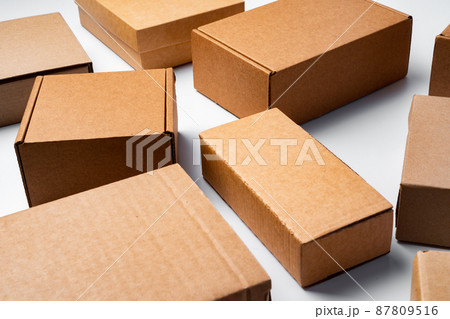 Lot of cardboard boxes on white background 87809516