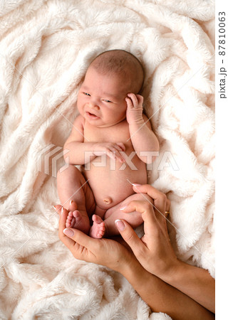 Close-up beautiful sleeping baby girl. Newborn baby girl, asleep Close-up beautiful sleeping baby girl. Newborn baby girl, asleep 87810063