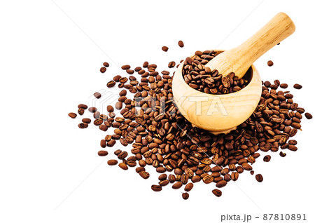 Coffee beans in wooden bamboo mortar isolated on white background. coffee beans isolated on white background. Coffee beans in wooden bamboo mortar isolated on white background. coffee beans isolated on white background. 87810891