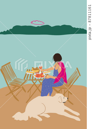 Woman enjoying beautiful seascape and having lunch, sitting with a dog at coast 87811161