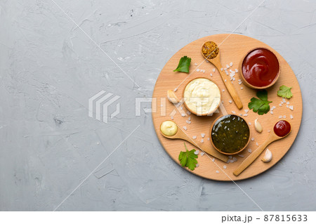 Many different sauces and herbs on table, flat lay top view. sauces on plate, healthy concept 87815633