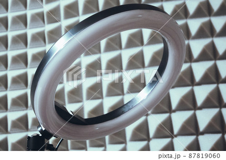 Ring RGB lamp on the background of sound-proof foam rubber. Ring RGB lamp on the background of sound-proof foam rubber. 87819060