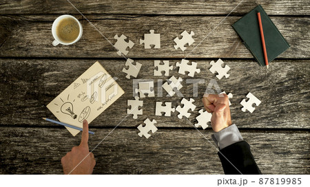 Thumb up and pointing to business symbols 87819985
