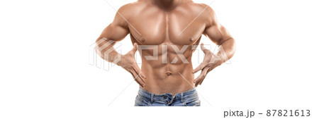 Strong healthy athletic man in jeans. Male torso isolated on white. Strong healthy athletic man in jeans. Male torso isolated on white. 87821613