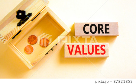 Core values symbol. Concept words Core values on wooden blocks on a beautiful white table white background. Wooden chest with coins. Business value and core values concept, copy space. Core values symbol. Concept words Core values on wooden blocks on a beautiful white table white background. Wooden chest with coins. Business value and core values concept, copy space. 87821855