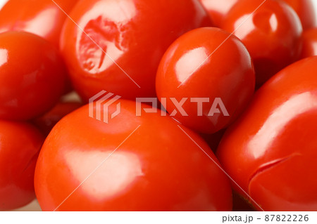 Pickled red tomatoes, close up and selective focus Pickled red tomatoes, close up and selective focus 87822226