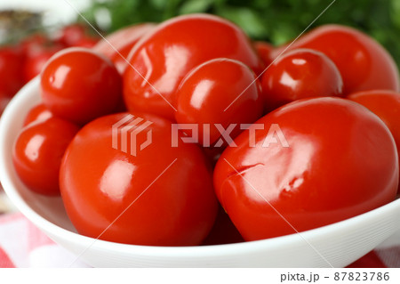 Concept of pickled vegetables with tomatoes, close up Concept of pickled vegetables with tomatoes, close up 87823786