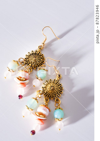jewerly bijouterie  earning with semiprecious at white background 87823946