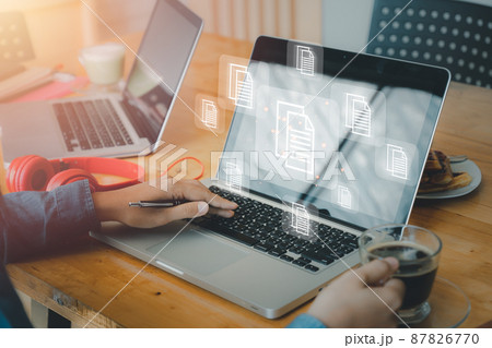 Business person hand using laptop computer with document management icon, Document management data system business internet technology concept..... 87826770