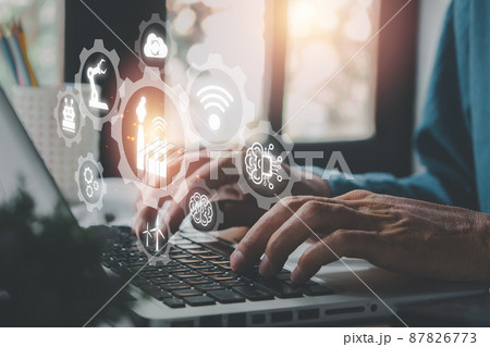 Smart industry 4.0 concept, Person hand using laptop computer with VR screen smart industry icon, AI, Artificial Intelligence, Automation robot arm, Smart factory. 87826773