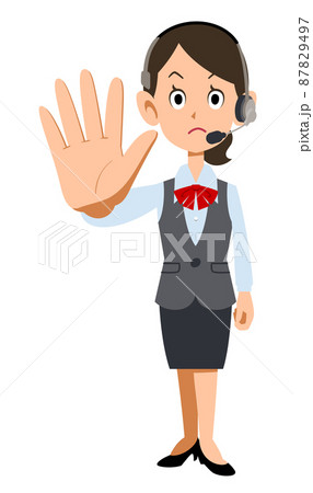 ヘッドセットを装着した制服着用の女性会社員が制止する 87829497