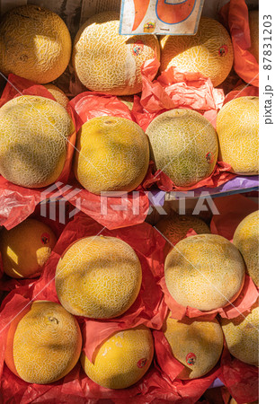 melons in local market, dramatic light 87831203