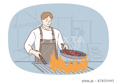 Male chef cook meat on fire in restaurant  87835445