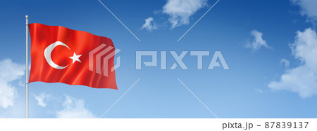 Turkish flag isolated on a blue sky. Horizontal banner Turkish flag isolated on a blue sky. Horizontal banner 87839137