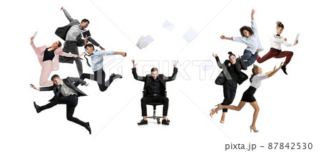 Business process. Young office workers jumping and dancing with folders, coffee, tablet on white background. Ballet dancers. Creative collage. 87842530