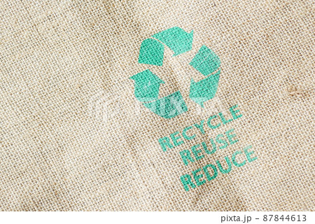 Recycled arrows sign on a shopping bag with vegetable  87844613