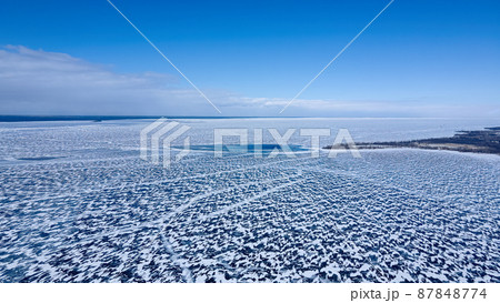 Aerial of frozen bay of Green Bay WI 87848774