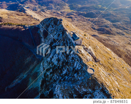 Petar II Petrovic-Njegos mausoleum on the top of mount Lovchen in Montenegro. Aerial view, drone 87849831