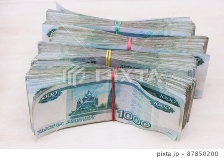 Bundles of bills. Russian banknotes. 1000 rubles bundles of bills. 87850200