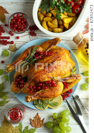 Thanksgiving Day roast turkey concept on white wooden table Thanksgiving Day roast turkey concept on white wooden table 87852473