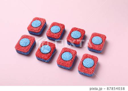 Concept of Dishwashing detergent accessories on pink background 87854038
