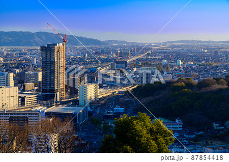 熊本駅周辺パノラマ風景(夕日の光芒景色) 87854418