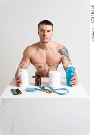 Fitness protein jars white on white background bodybuilder powder strong high back body backache sick white health muscular Tension sickness, disease suffer attractive 87856316