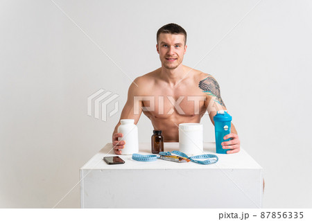 Fitness protein jars white on white background bodybuilder powder strong high hurt painful, ill spine isolated young medicine, muscular chronic. Tension neck lower suffer attractive 87856335