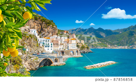 Beautiful view of Amalfi on the Mediterranean coast with lemons in the foreground, Italy Beautiful view of Amalfi on the Mediterranean coast with lemons in the foreground, Italy 87856858