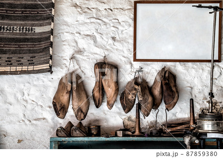 Old shoemaker's equipment in the museum Old shoemaker's equipment in the museum 87859380
