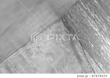 dry wood and grey rough cement wall black and white background dry wood and grey rough cement wall black and white background 87878424
