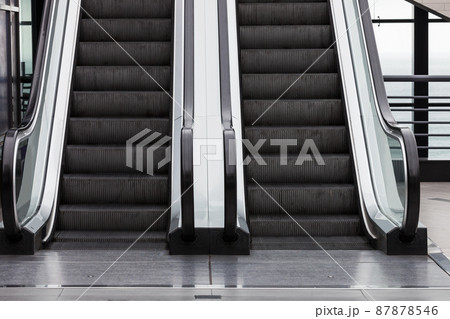 new escalator in modern building new escalator in modern building 87878546