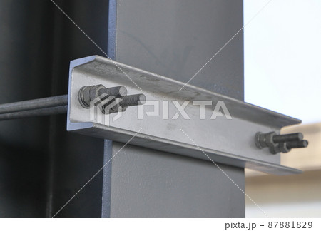 Metal supports Bolts, nuts, threaded on beams of the Steel Construction. Metal supports Bolts, nuts, threaded on beams of the Steel Construction. 87881829