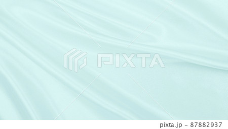 Smooth elegant blue silk or satin luxury cloth texture as abstract background. Luxurious background design Smooth elegant blue silk or satin luxury cloth texture as abstract background. Luxurious background design 87882937