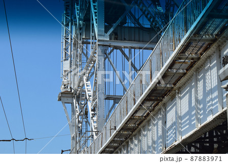 Structural elements of an old steel bridge. Arches and farms riveted. Structural elements of an old steel bridge. Arches and farms riveted. 87883971
