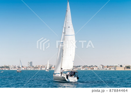 Sailing yacht in Mediterranean sea with Larnaca city on background. Cyprus 87884464