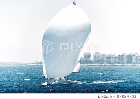 Sailing boat during a regatta in mediterranean sea 87884703