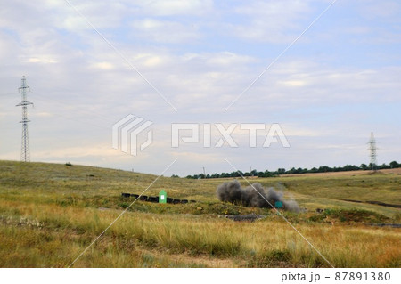 War Concept. Military silhouettes fighting scene on war fog sky background, World War Soldiers Silhouette Below Cloudy Skyline At night. Armored vehicle fight scene. Selective focus War Concept. Military silhouettes fighting scene on war fog sky background, World War Soldiers Silhouette Below Cloudy Skyline At night. Armored vehicle fight scene. Selective focus 87891380