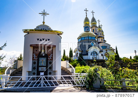 Christian church cross in high steeple tower for prayer 87897017
