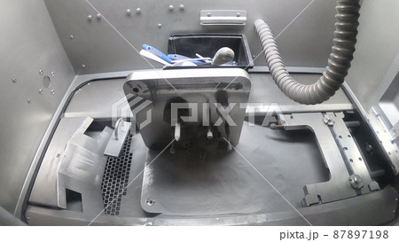 Platform with Objects Printed From Metal Powder Stands in Working Chamber 87897198