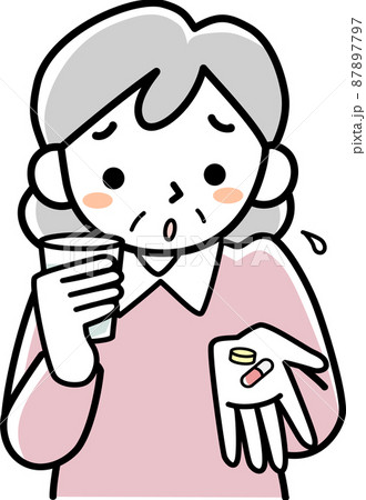 薬をのむのを嫌がるシニア女性の上半身 87897797