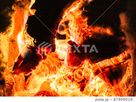 Beautiful old fireplace with light flame fire for heating building room Beautiful old fireplace with light flame fire for heating building room 87900019