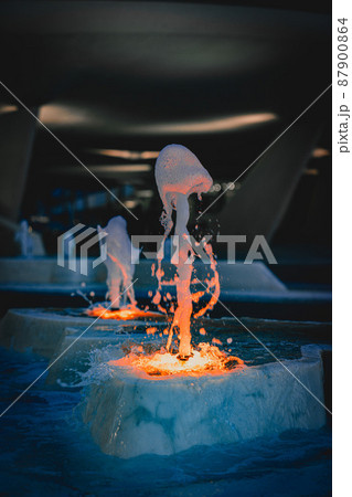 close up shot of city fountain with blue and orange lights, Cyprus 87900864