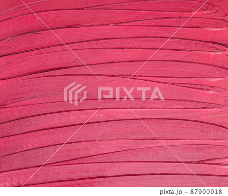 Texture of red, scarlet, smudged lipstick. Cosmetic background Texture of red, scarlet, smudged lipstick. Cosmetic background 87900918