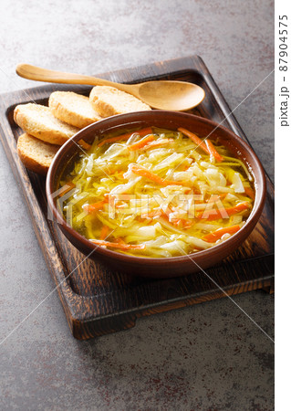 Sopa Juliana traditional Vegetable Soup From Portugal closeup in the plate. Vertical 87904575