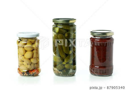 Jars of pickled vegetables isolated on white background Jars of pickled vegetables isolated on white background 87905340