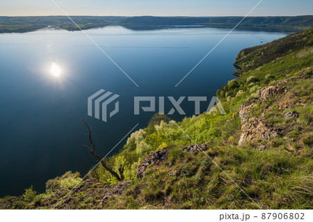 Amazing spring sunset view on the Dnister River Canyon, Bakota Bay, Khmelnytsky region, Ukraine. Amazing spring sunset view on the Dnister River Canyon, Bakota Bay, Khmelnytsky region, Ukraine. 87906802