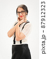 Studio photo of middle aged woman starting getting grey-haired wearing black and white clothes on white background, middle age sexy lady, happy life concept 87912323