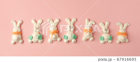 Colorful easter Sweet cookies, meringue on pink background, colorful seasonal holiday concept, stylish greeting card, invitation, flyer. Delicious traditional snack cookies for kids, copyspace, banner Colorful easter Sweet cookies, meringue on pink background, colorful seasonal holiday concept, stylish greeting card, invitation, flyer. Delicious traditional snack cookies for kids, copyspace, banner 87916695