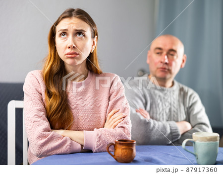 Sad woman having quarrel with her husband 87917360